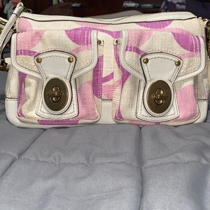COACH Pink and cream hand bag.